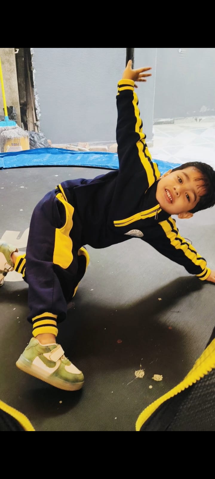Child doing trampoline exercise